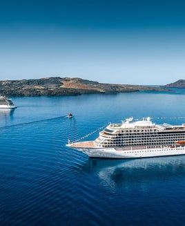 Viking Star and Viking Sea cruise ships near Santorini.