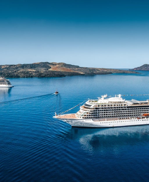 Viking Star and Viking Sea cruise ships near Santorini.