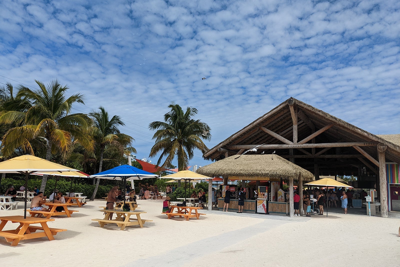 Open-air lunch pavilion with picnic tables outside