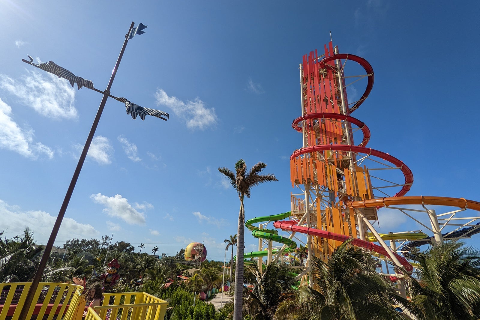 Tall brightly colored waterslide tower