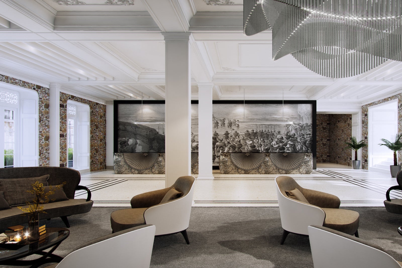large white and grey hotel lobby with wall mural and chairs