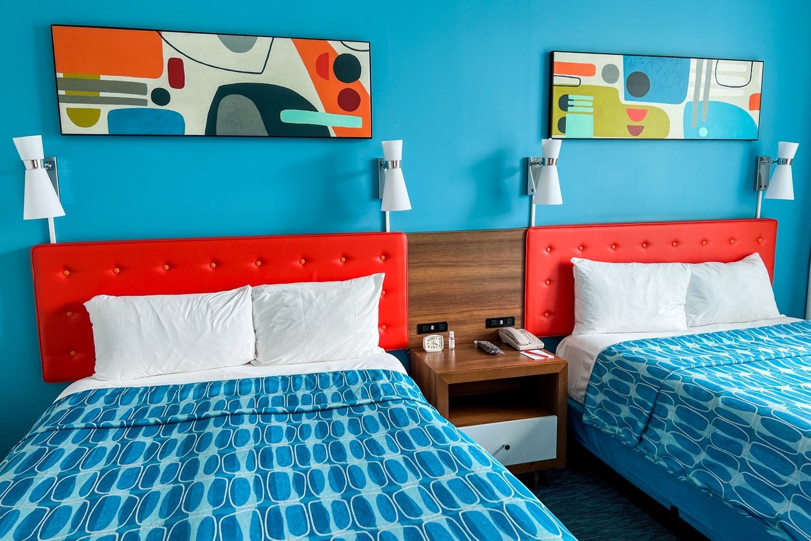 The two beds in the hotel room.