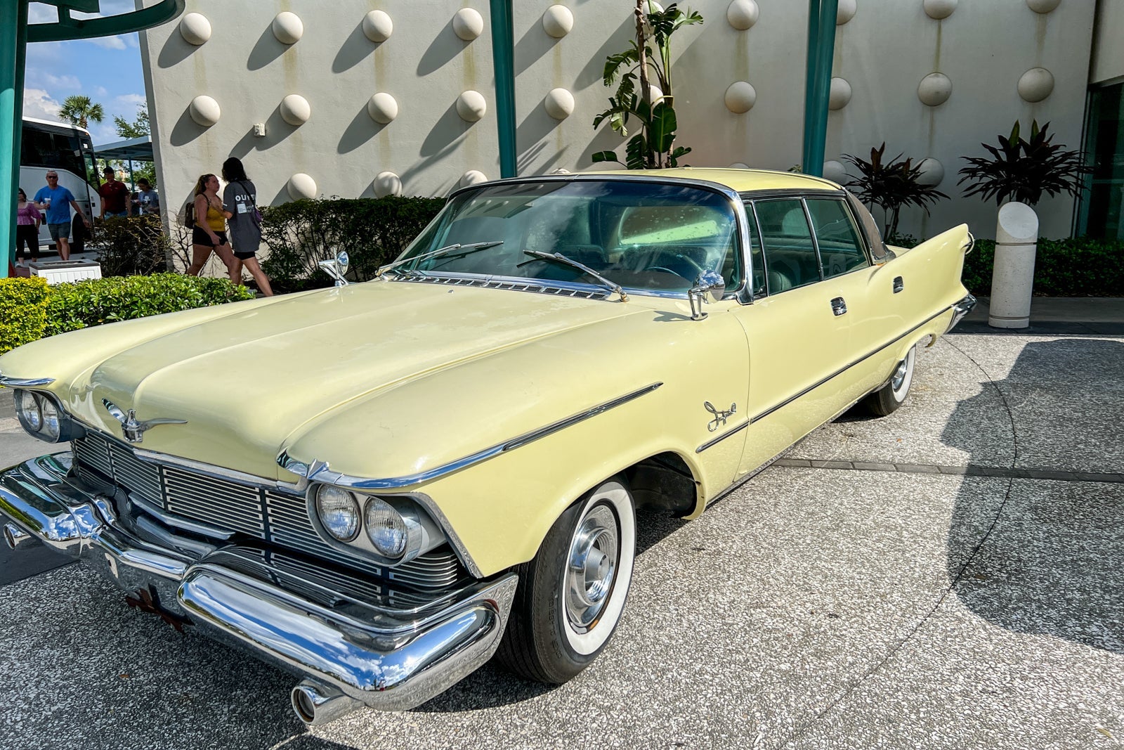 A classic car parked outside Universal's Cabana Bay Beach Resort.
