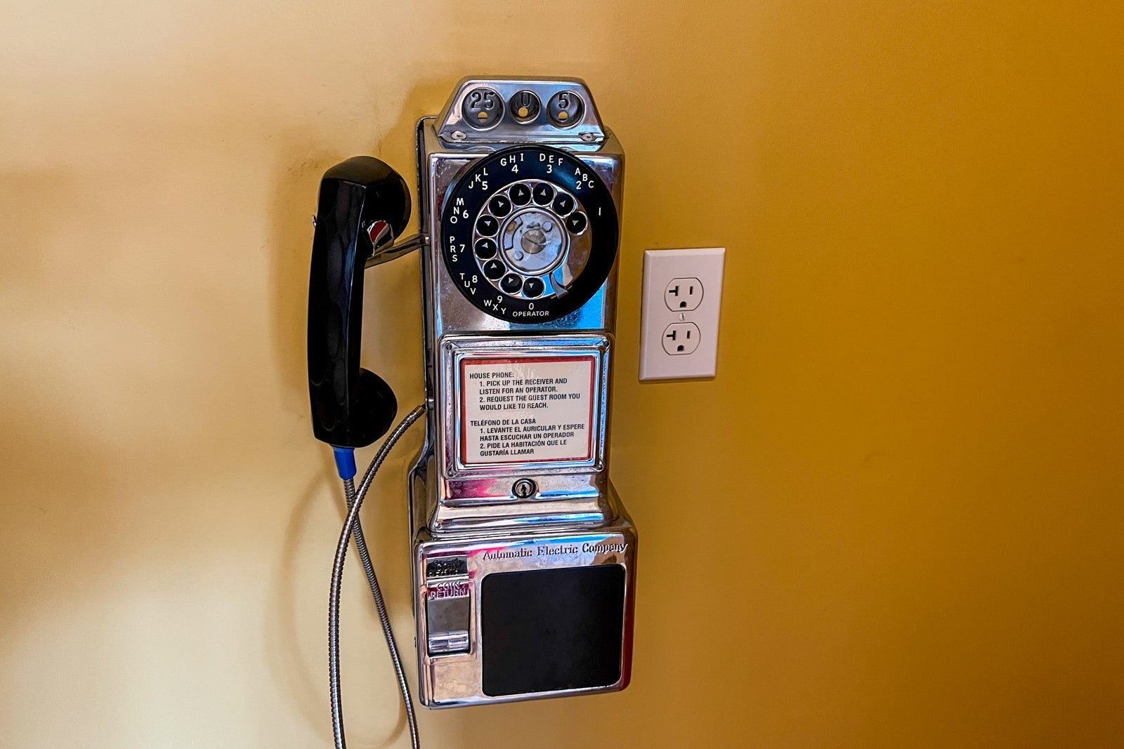 A rotary phone near the lobby.