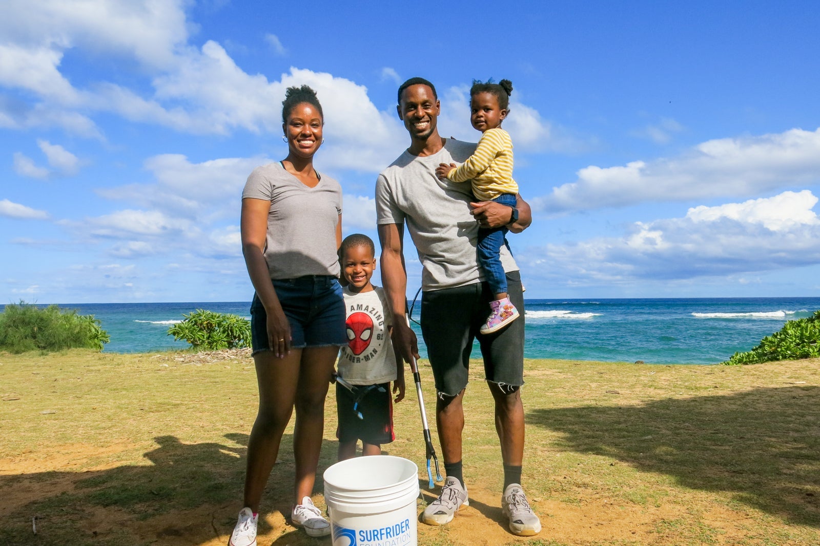 Family participates in beach clean-up program in Hawaii