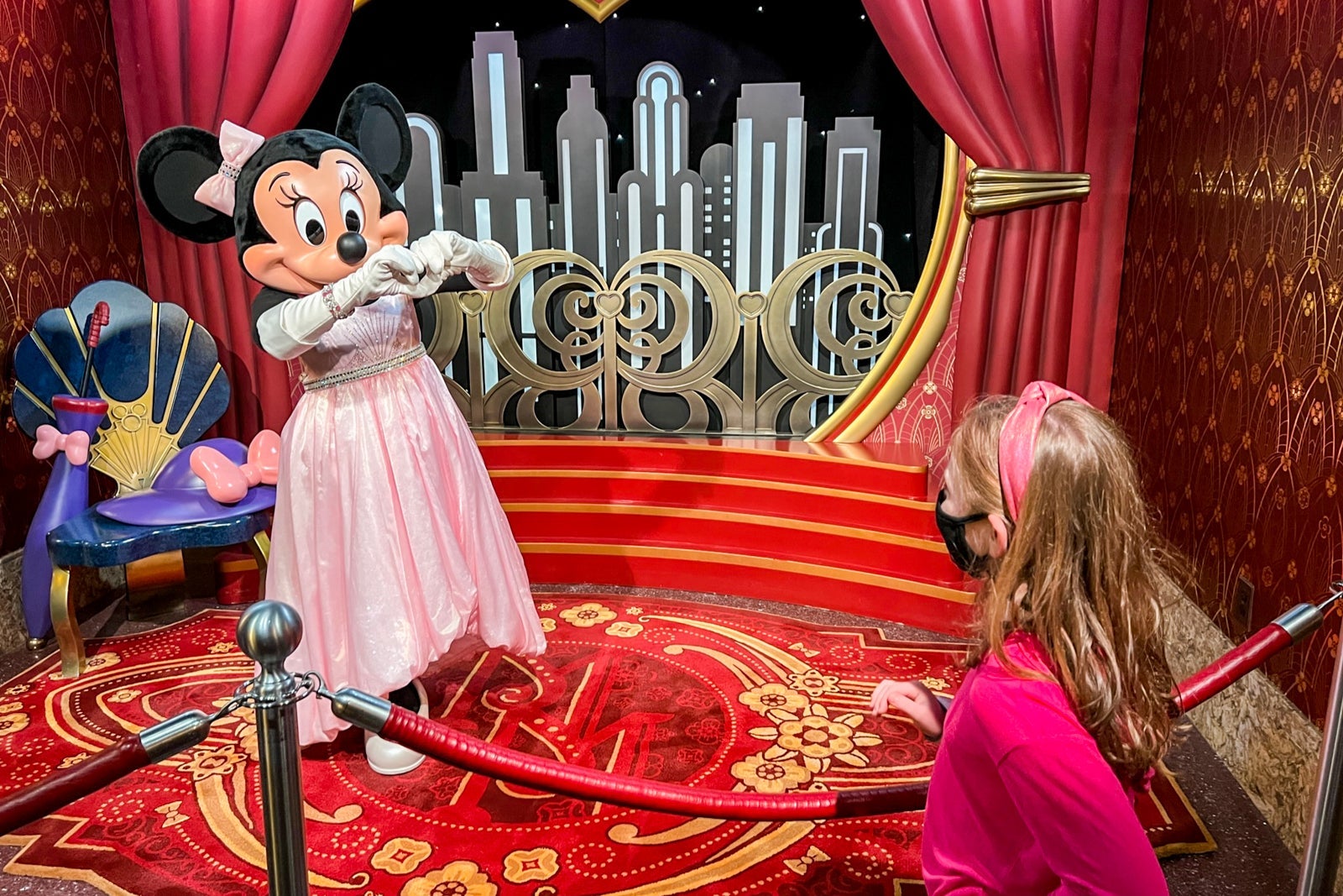 Minnie Mouse smiling at the author's daughter.