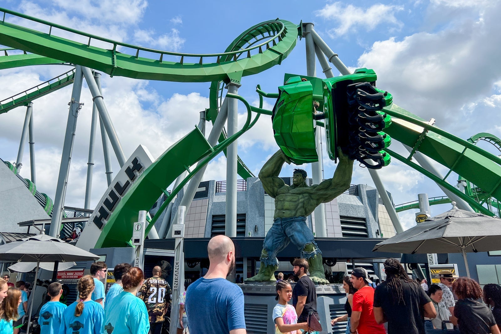 Hulk holding roller coaster track outside The Incredible Hulk Coaster
