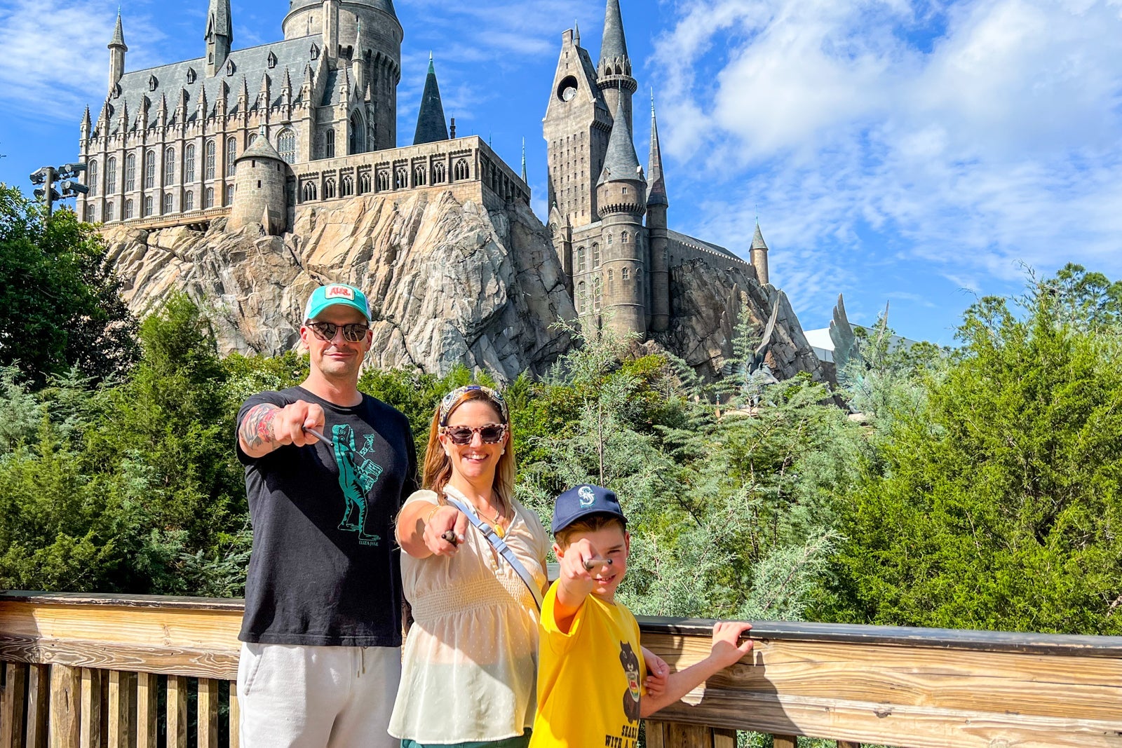 Family standing in front of Hogwarts Castle at Universal Orlando