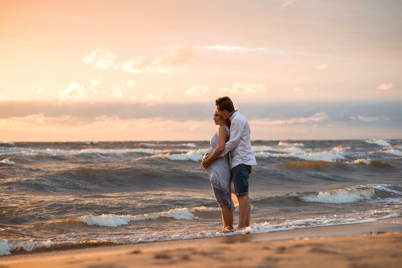 Couple standing on beach