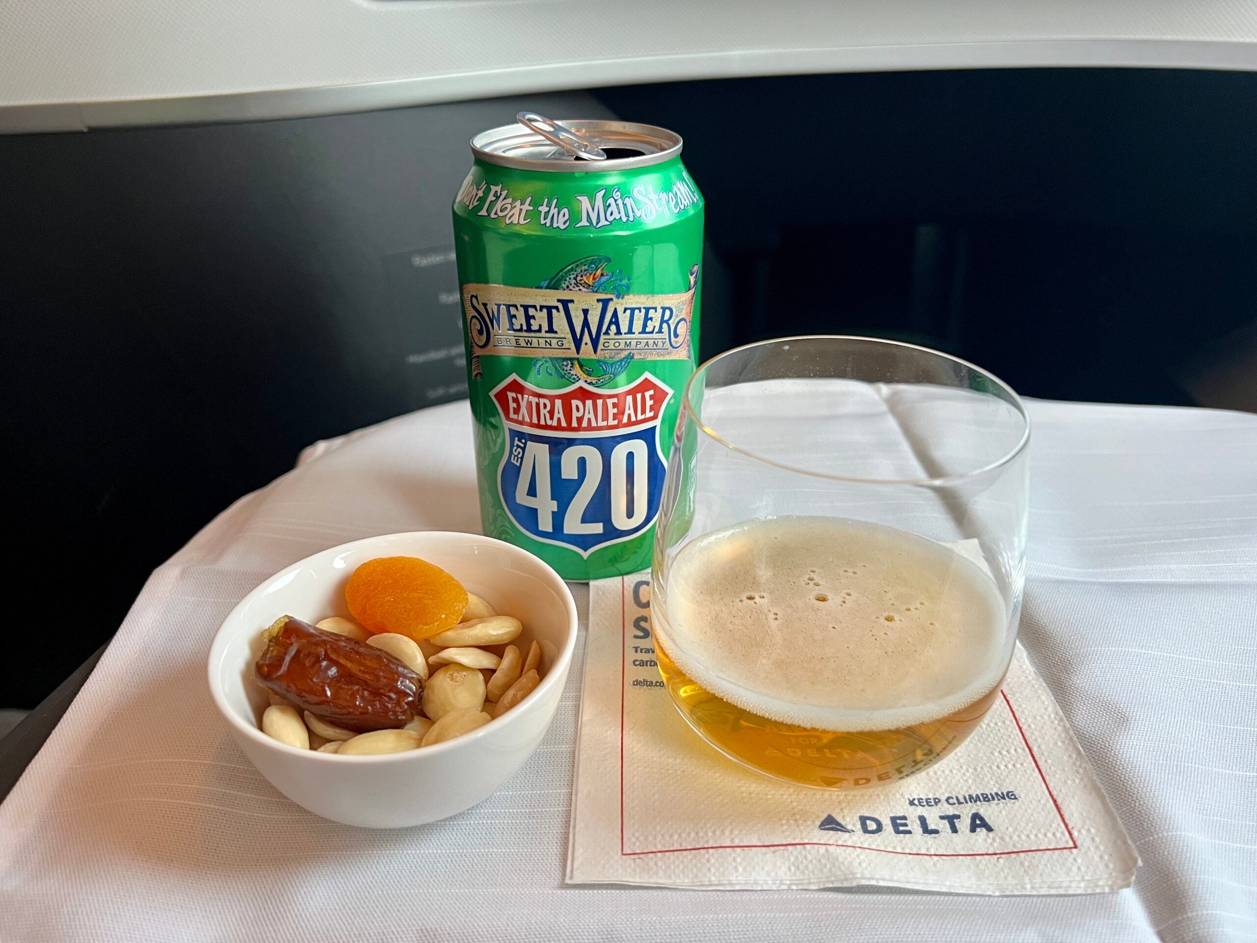 Beer and nuts on Delta One