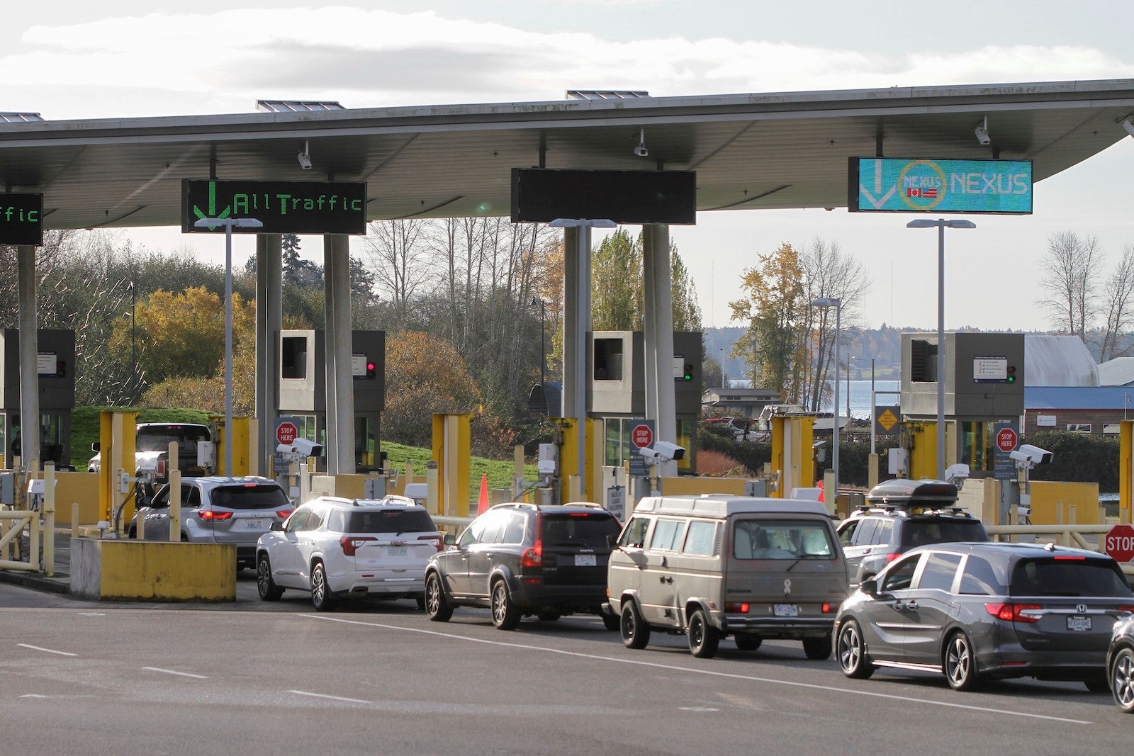 Vehicles from Canada line up to enter the United States