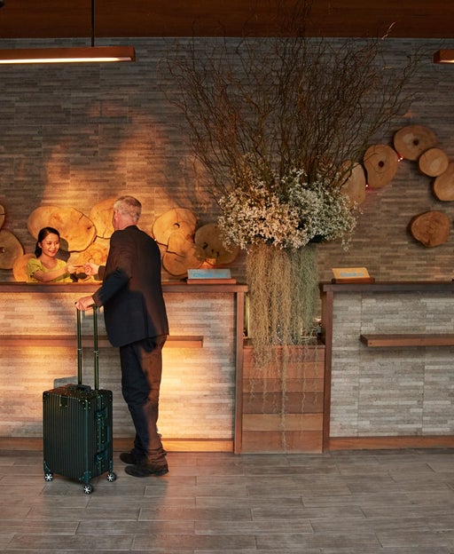 Man at hotel front desk