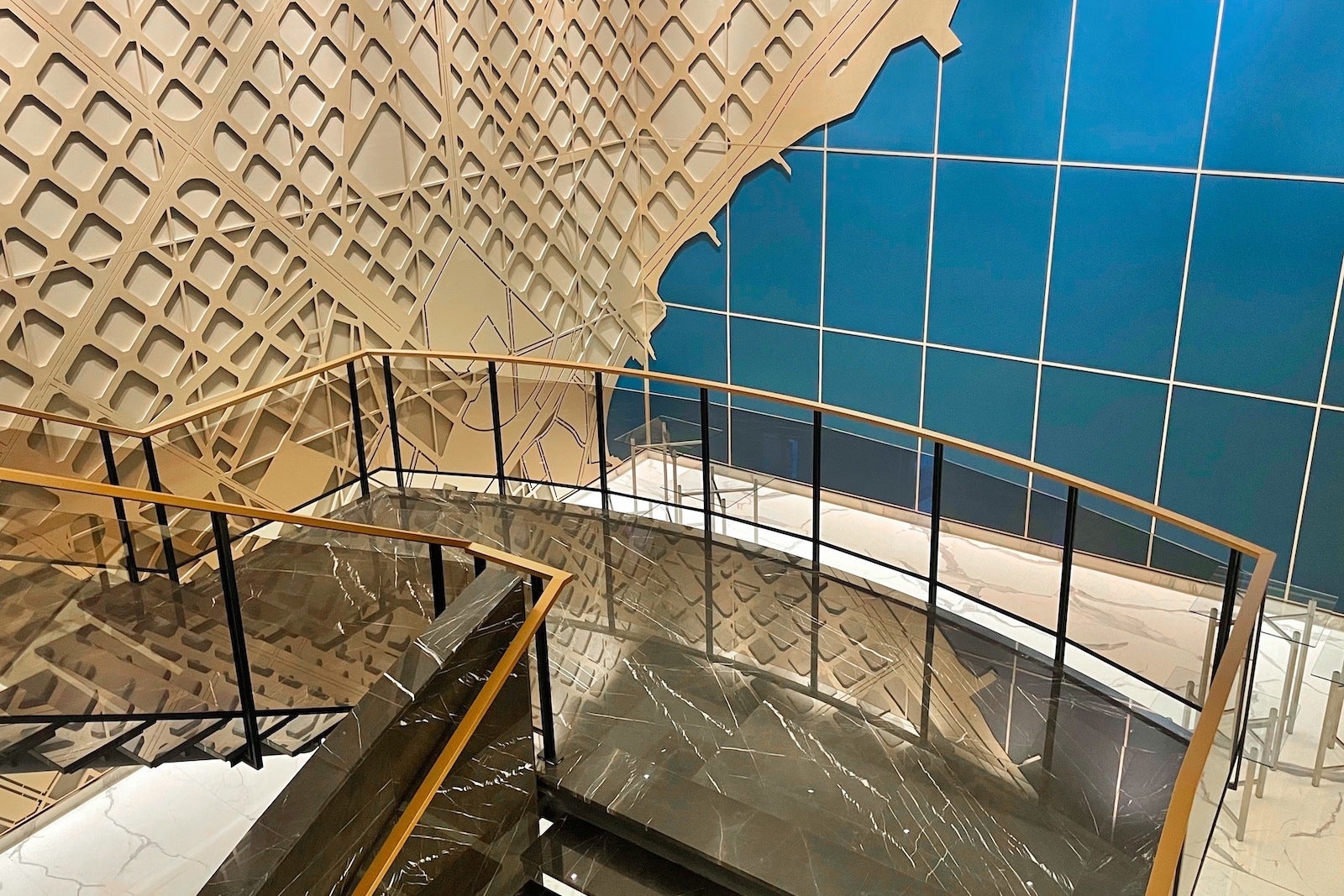 blue wall with gold map overlay of Barcelona