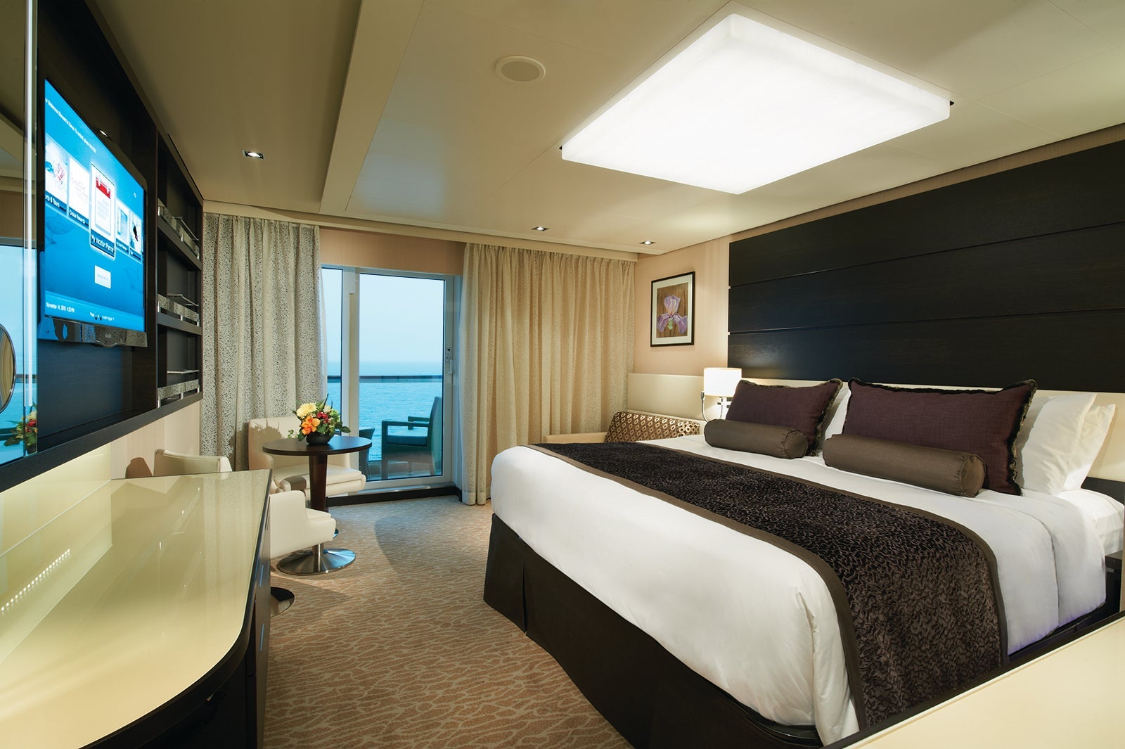 Norwegian Cruise Line suite decorated in whites and browns