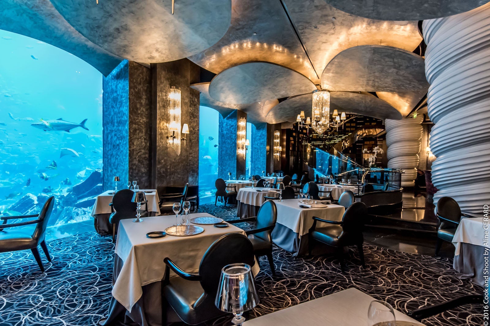 fancy restaurant with aquarium walls