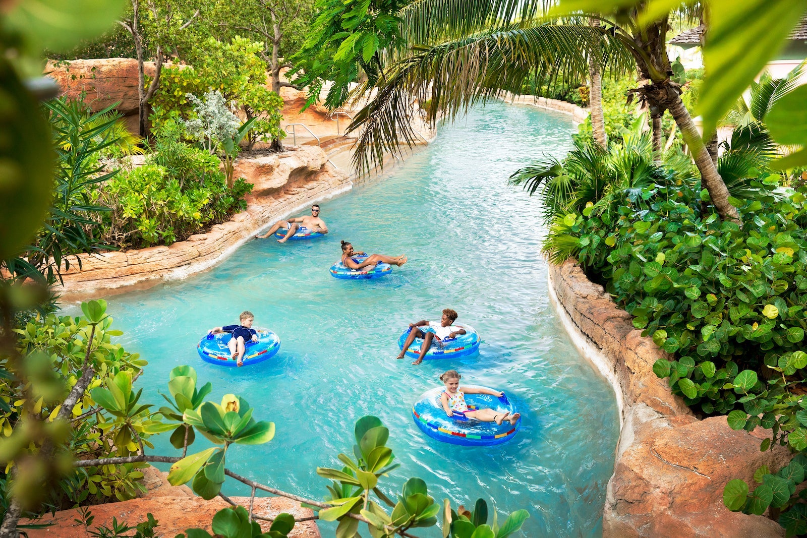 kids on tubes in lazy river