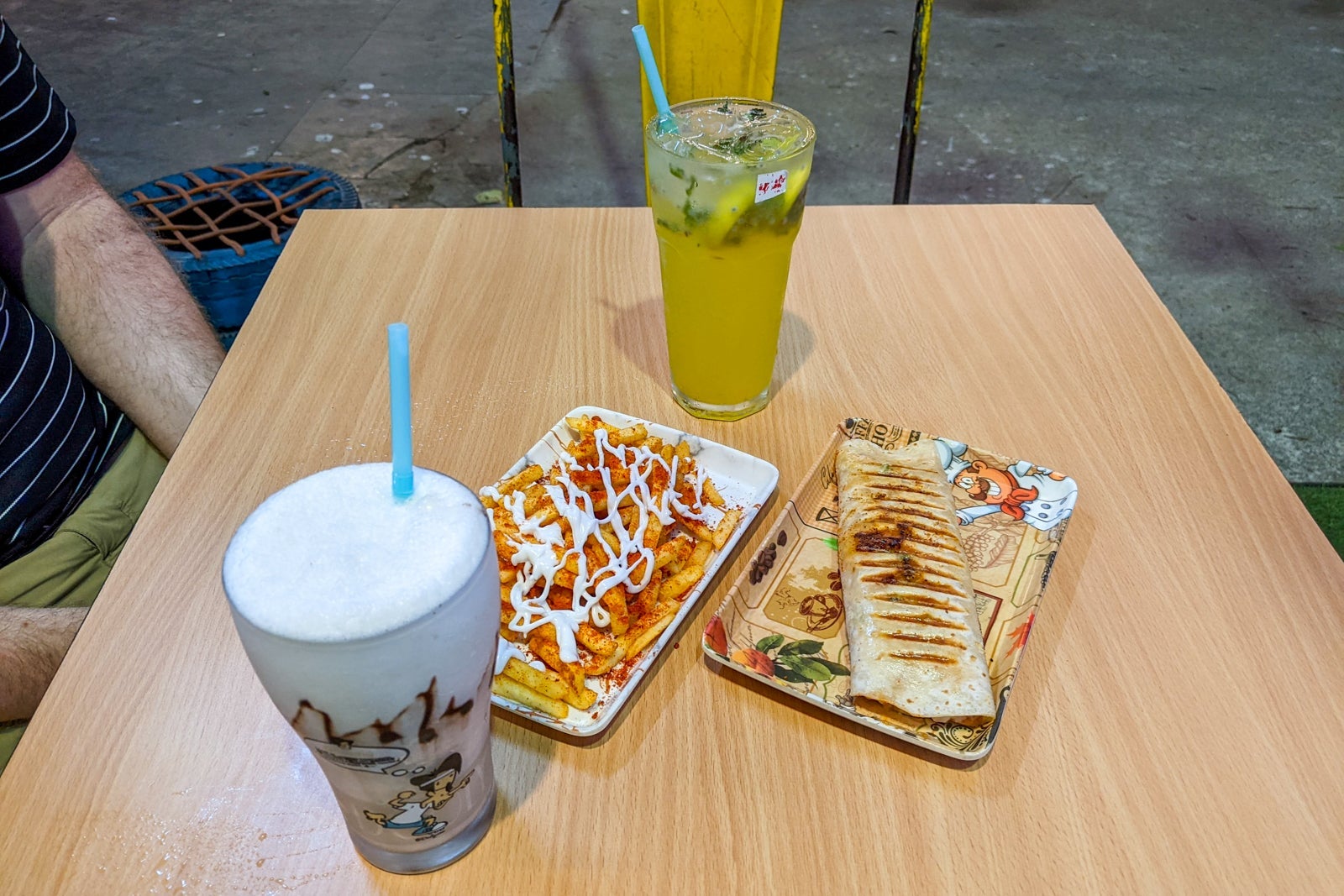 Meal at an open-air cafe near Park Hyatt Chennai