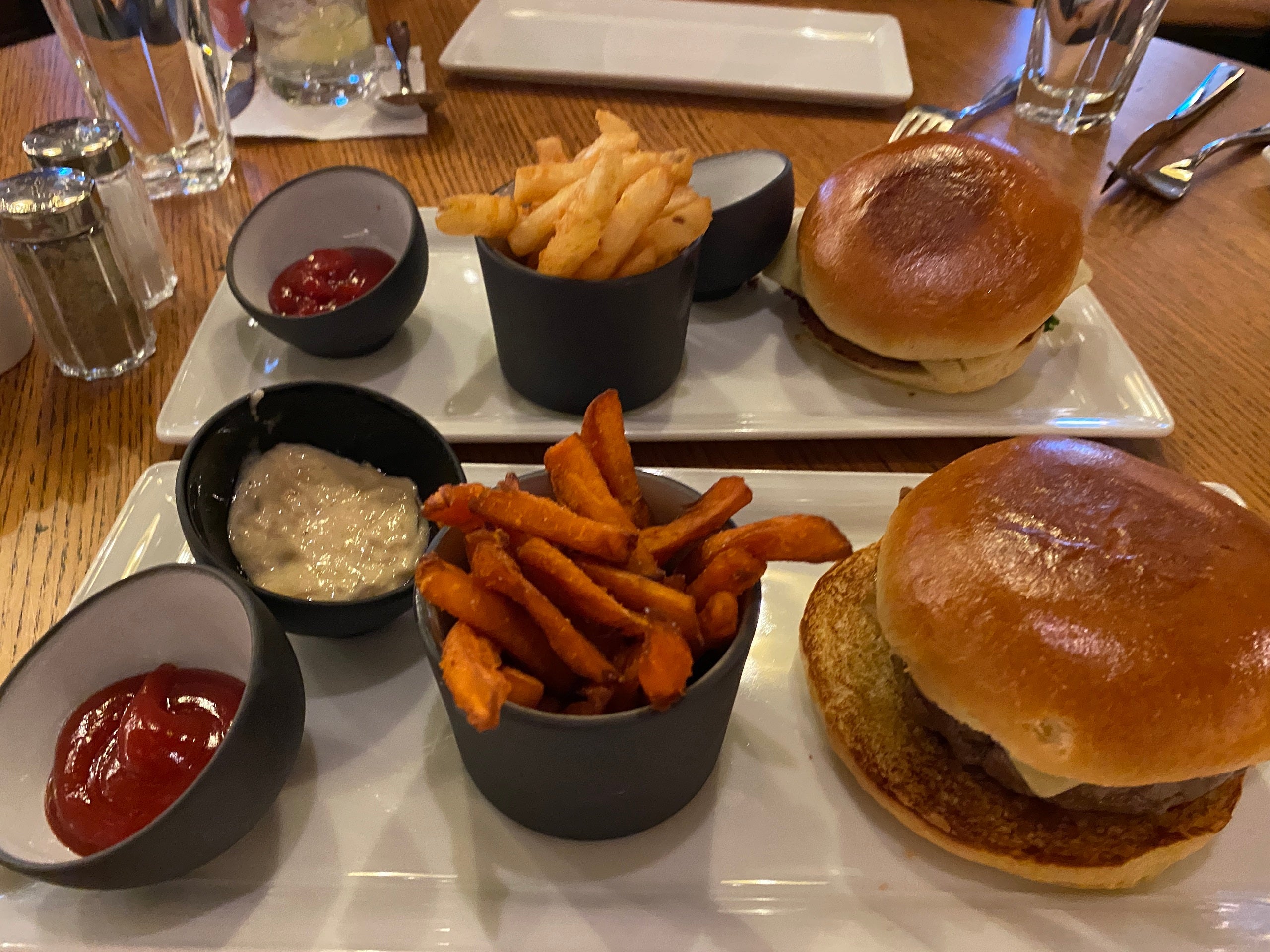 The SDG Burger and fried chicken sandwich at the Salty Dog Gastropub on Princess Cruises' Discovery Princess.