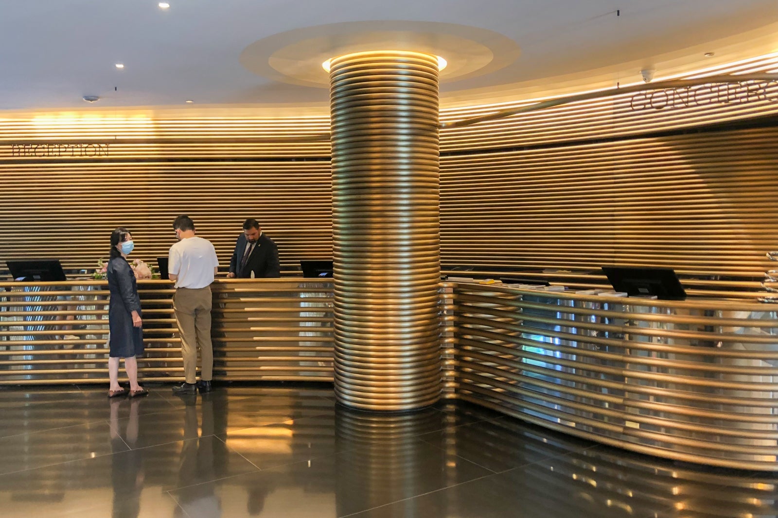A long, curved brass desk awaits you when you check in to The Watergate Hotel.