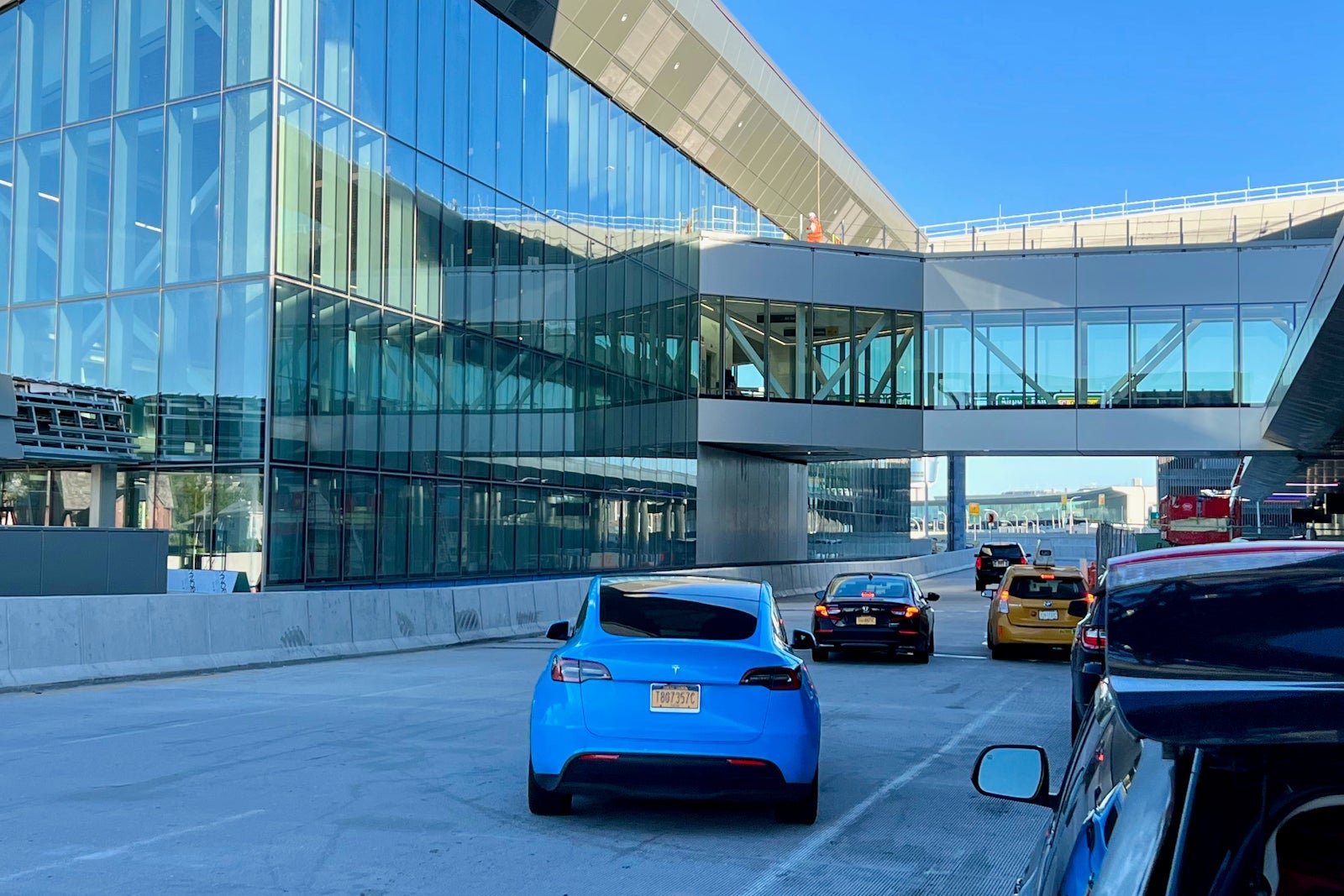 Revel Tesla at the airport. ZACH GRIFF/THE POINTS GUY