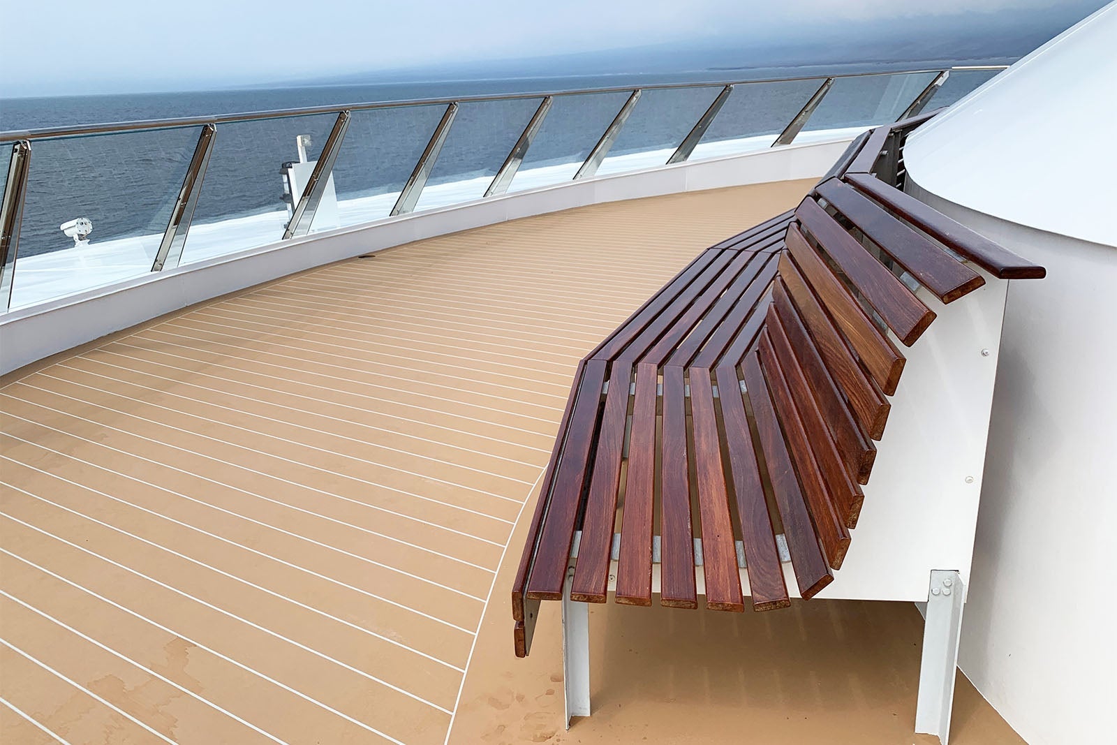 Cruise ship deck with wooden bench