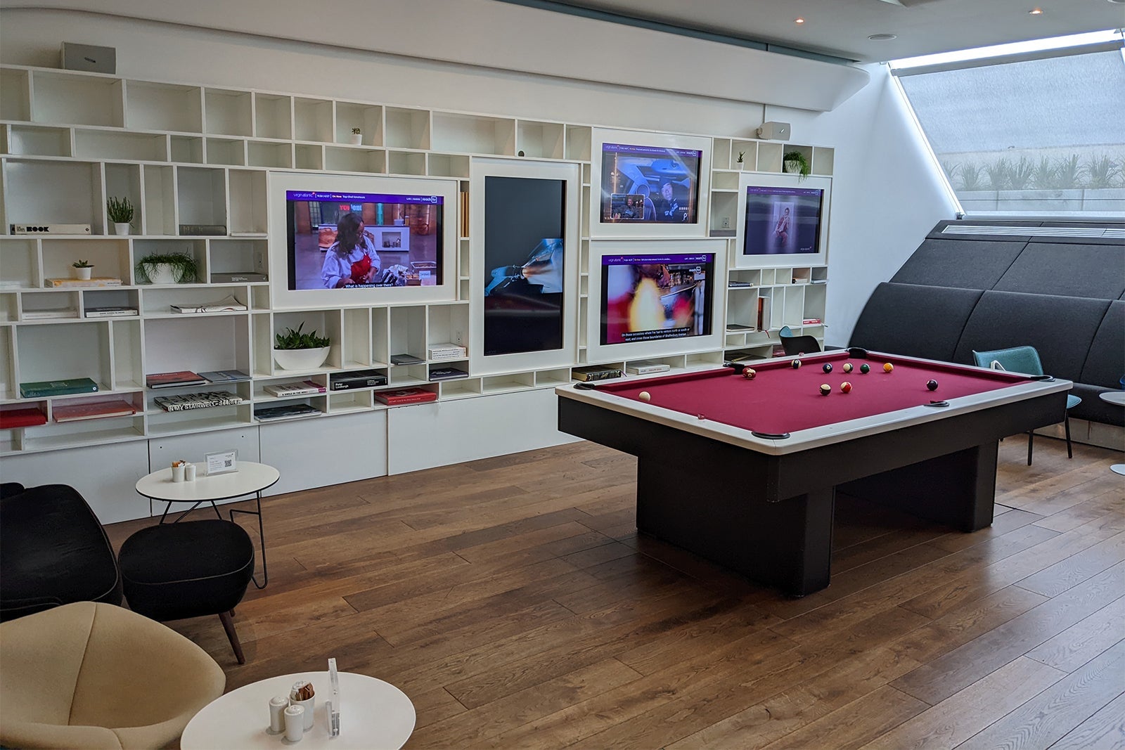 Pool table and televisions in Virgin Atlantic's Upper Class lounge