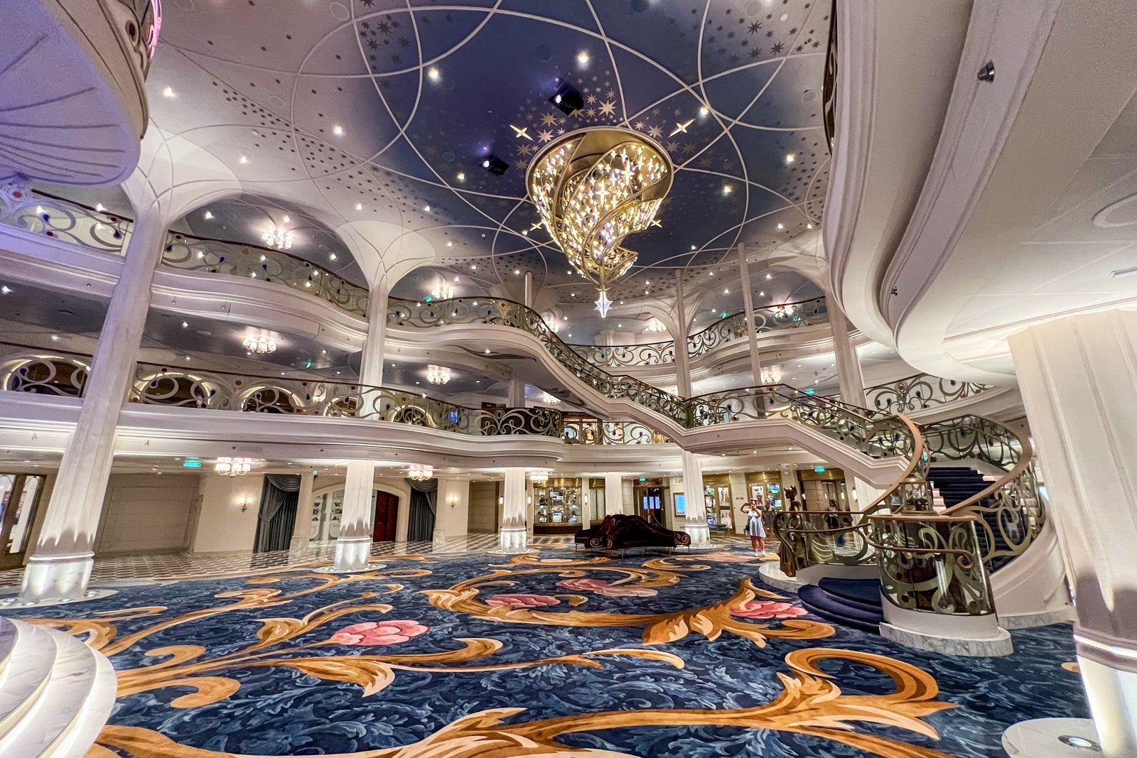 The Grand Hall with stunning chandelier aboard Disney Wish