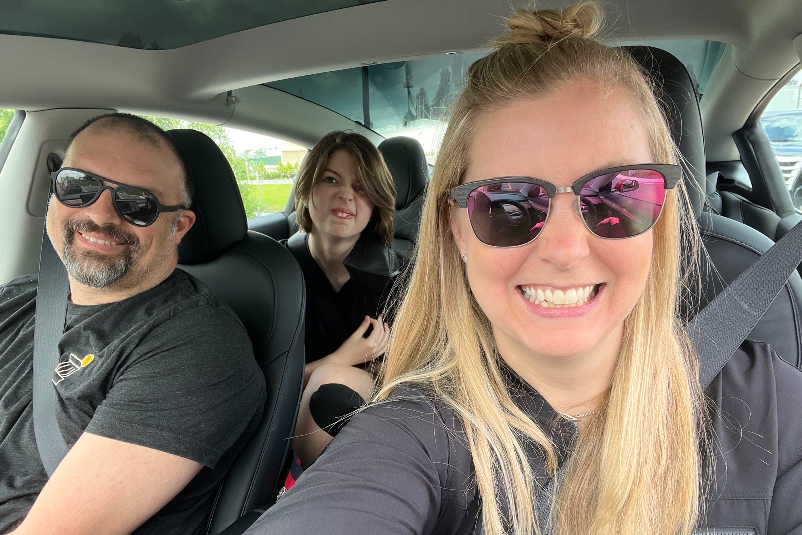 family in Tesla rental
