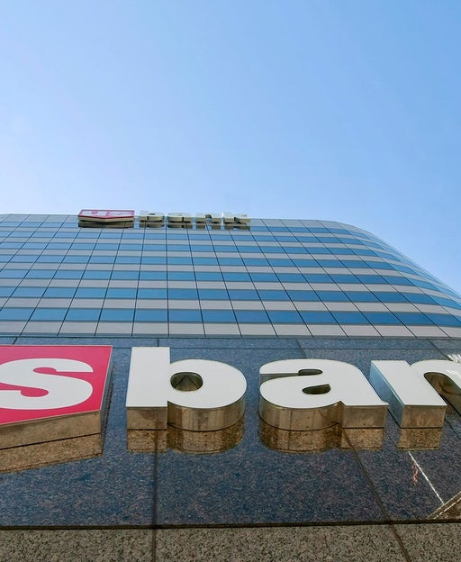looking up at a skyscraper bearing the US Bank logo