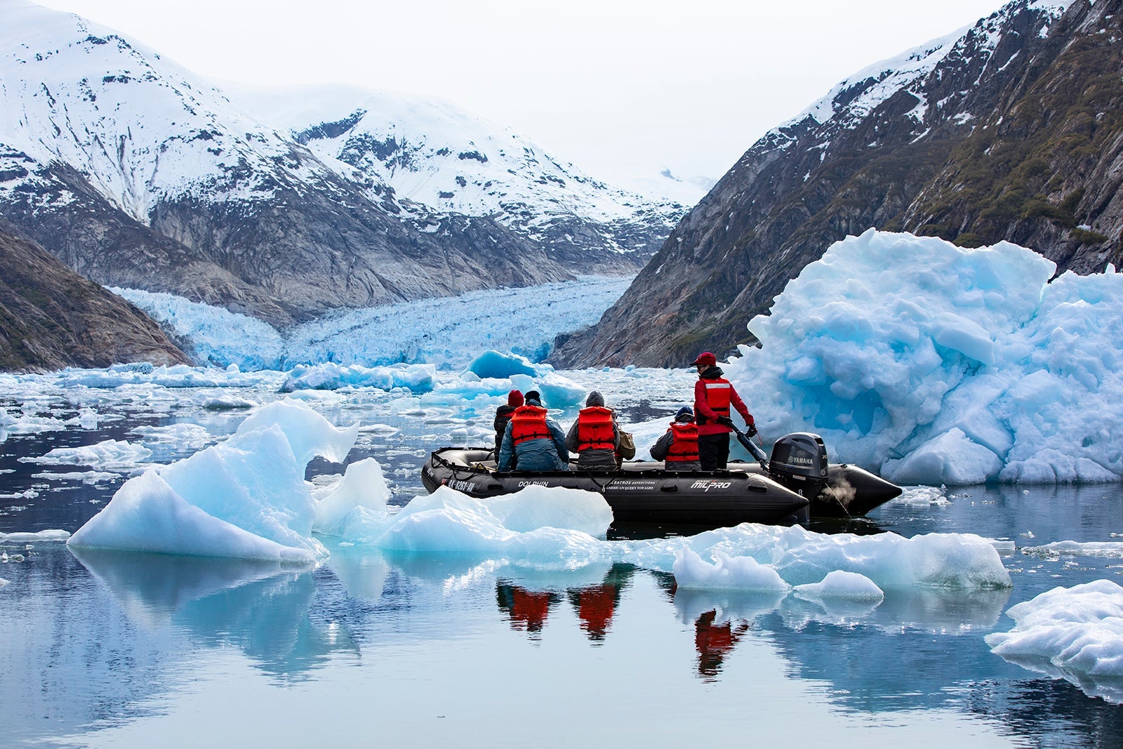 Zodiac navigating through Endicott Arm icebergs