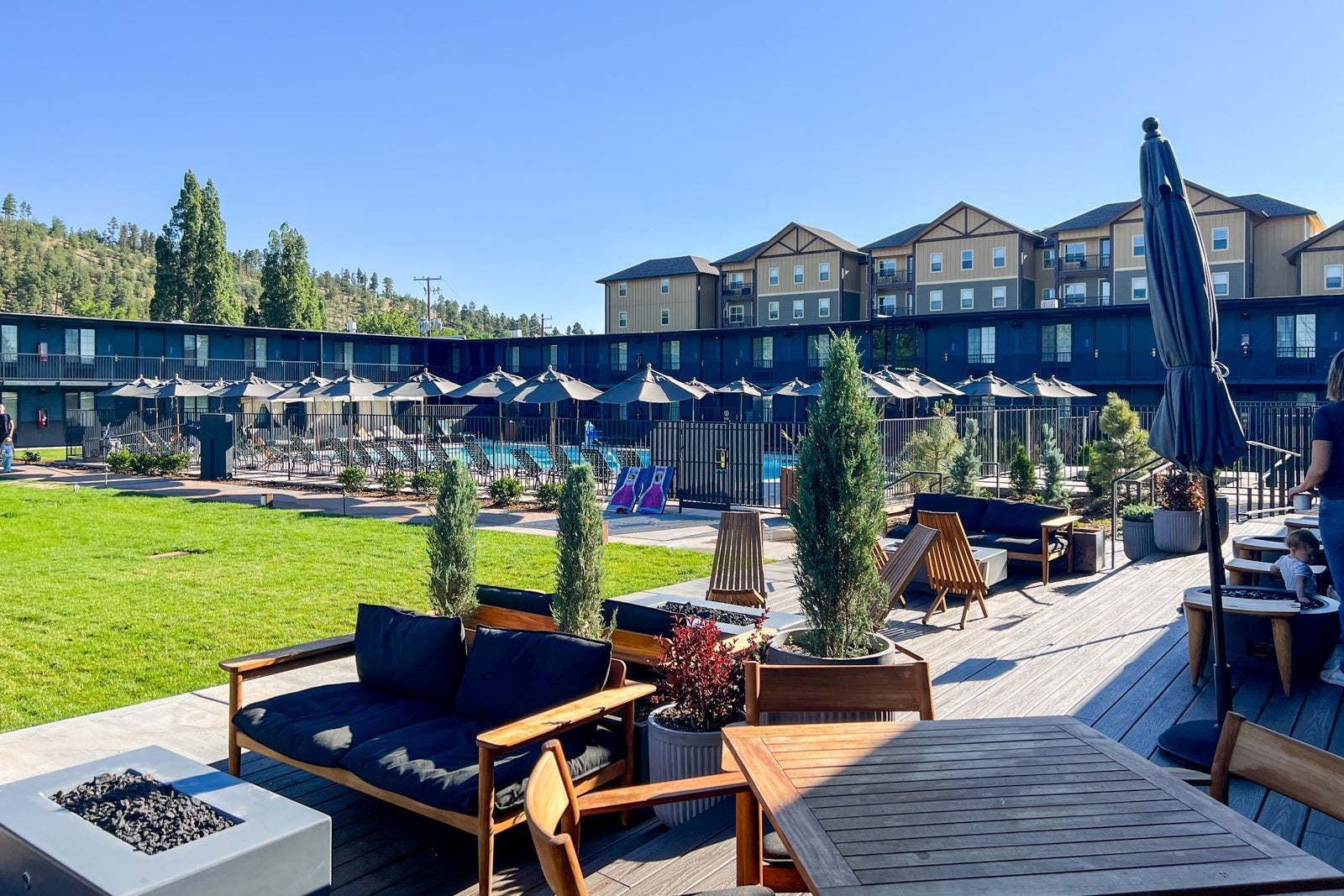 Lounge chairs and fire pit outside hotel