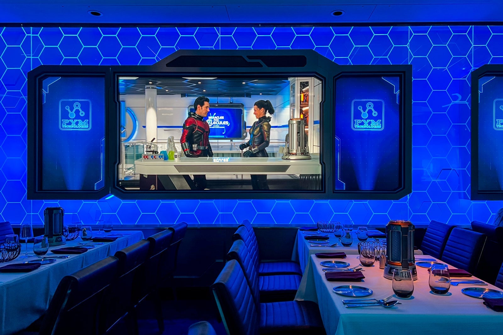 Video screen showing Ant-man and the Wasp at a Disney cruise restaurant