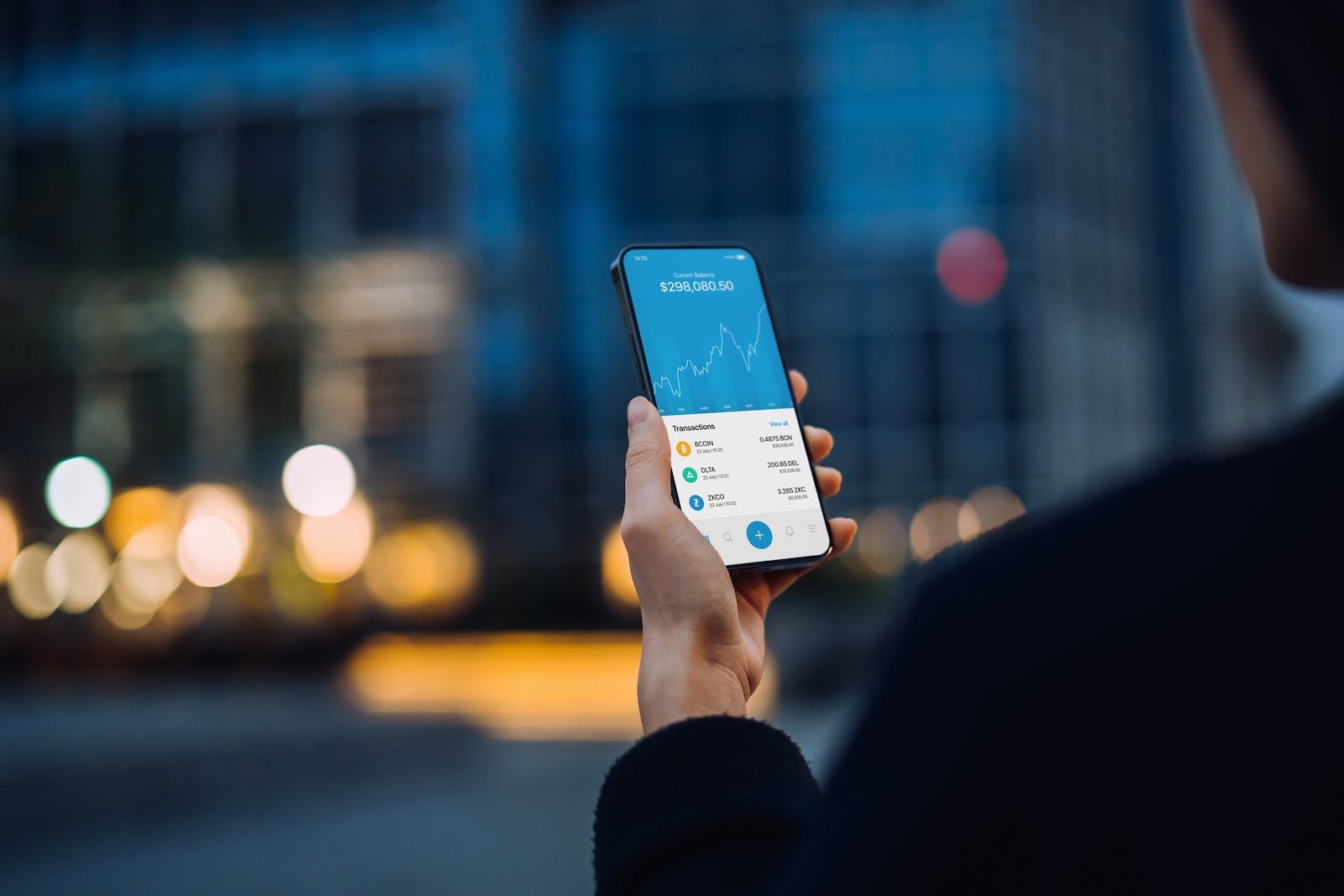 person looking at smartphone