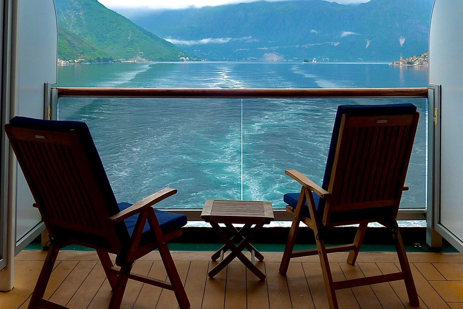 Cruise ship balcony facing ship's wake