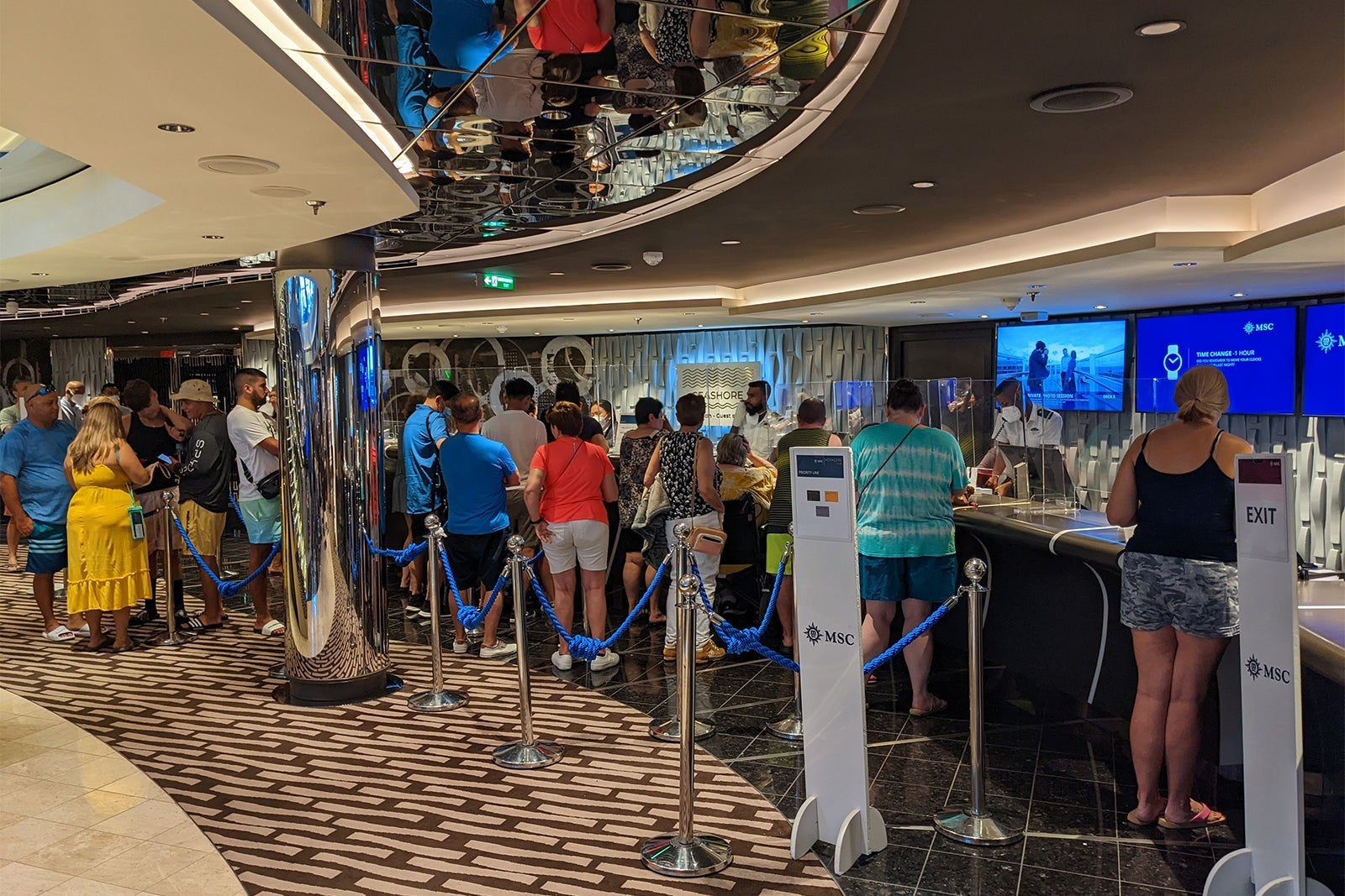 Long line at MSC Seashore's guest relations desk