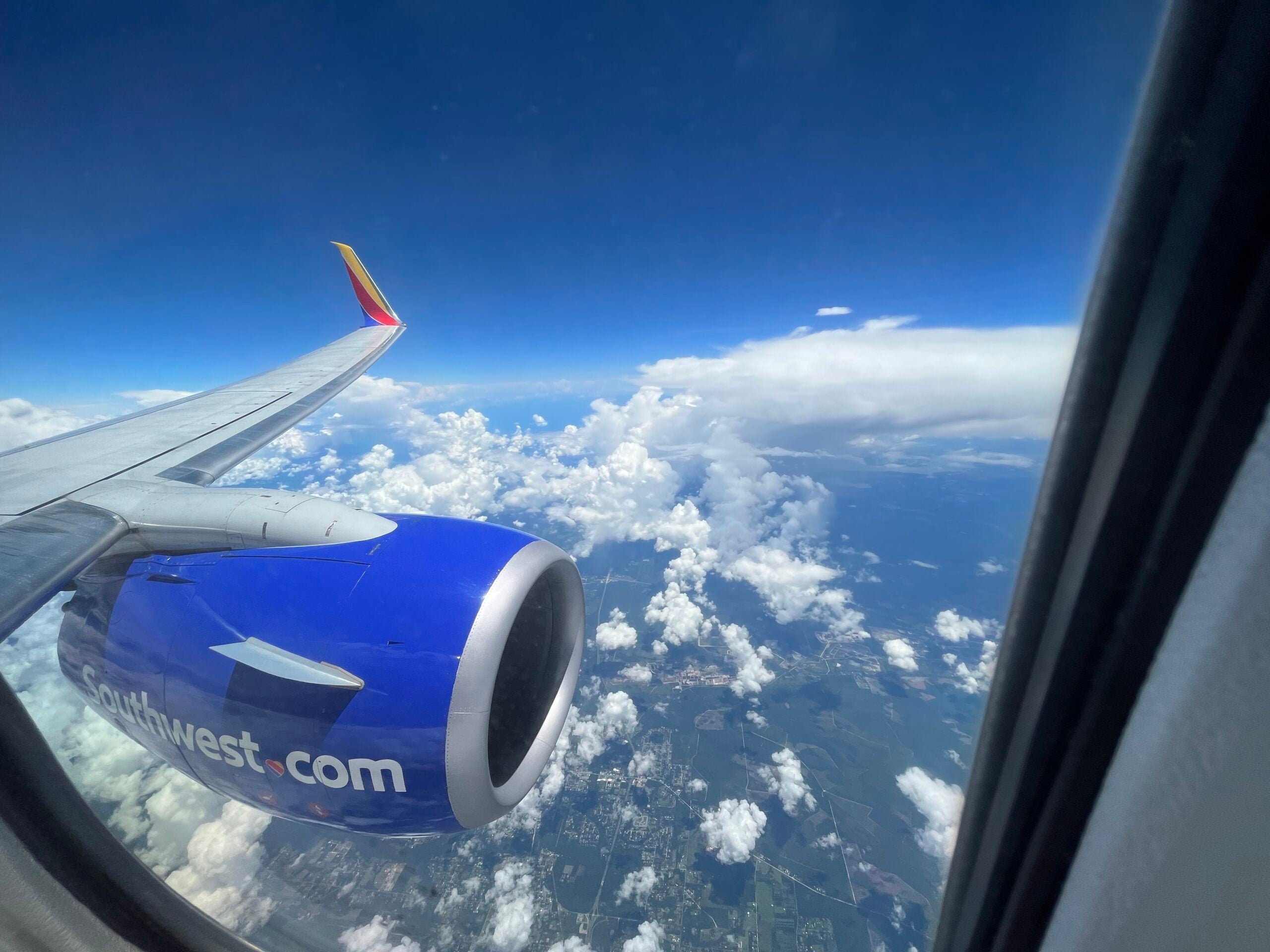 southwest plane in air clouds