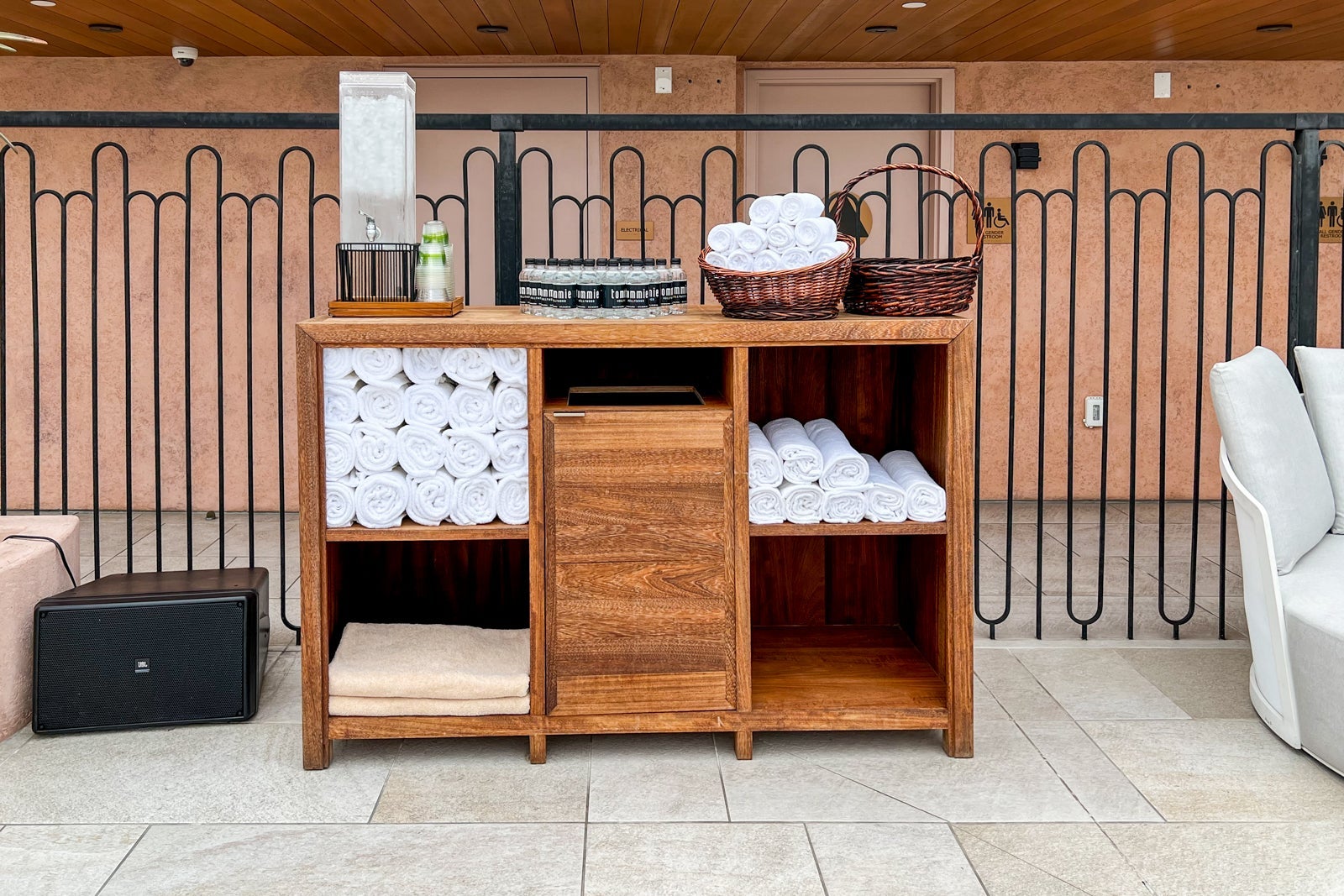Towel and water bar at rooftop pool