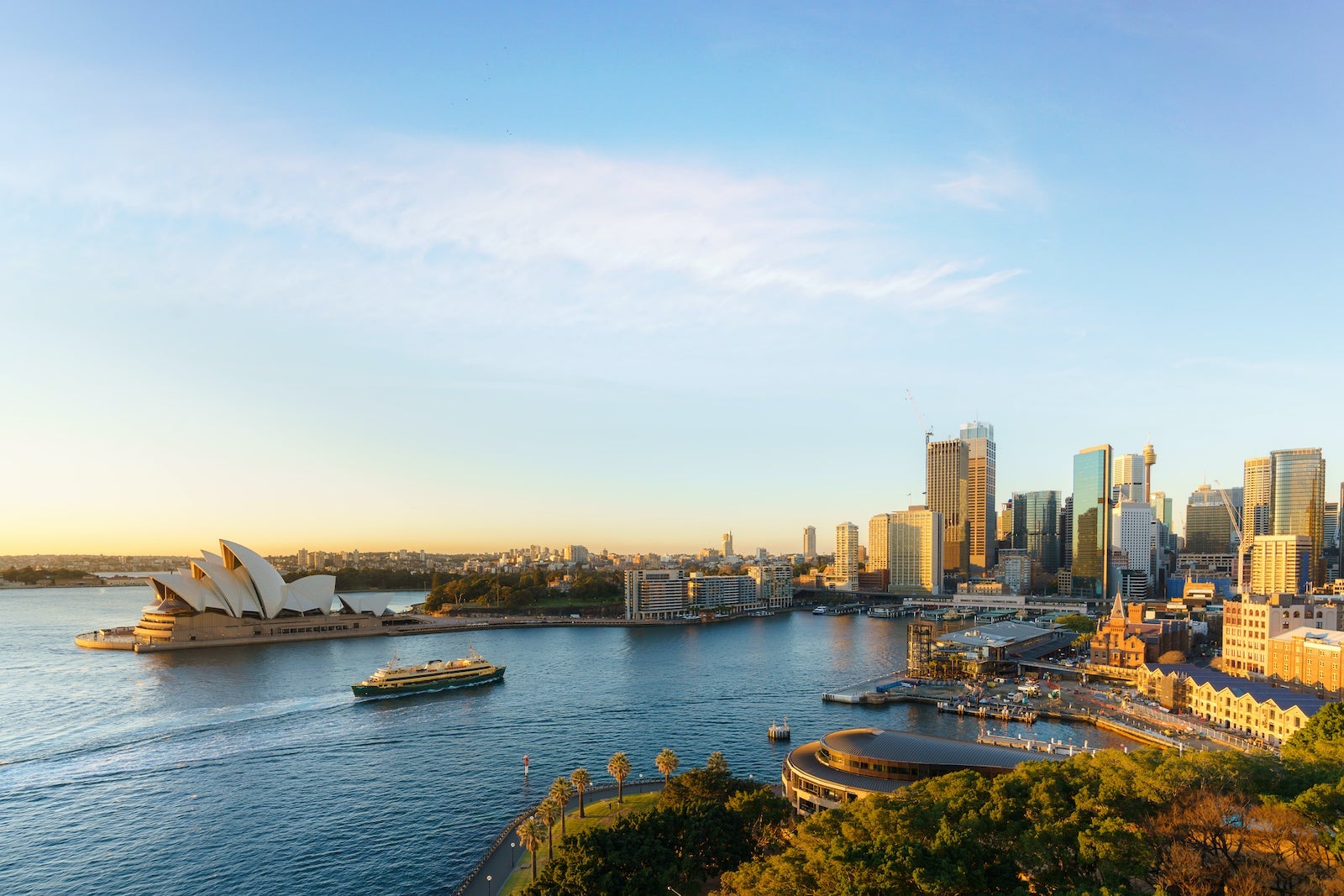 Cityscape image of Sydney with Harbor bridge and famous landmark and business office building skyscraper and skyline at Sydney, Australia.