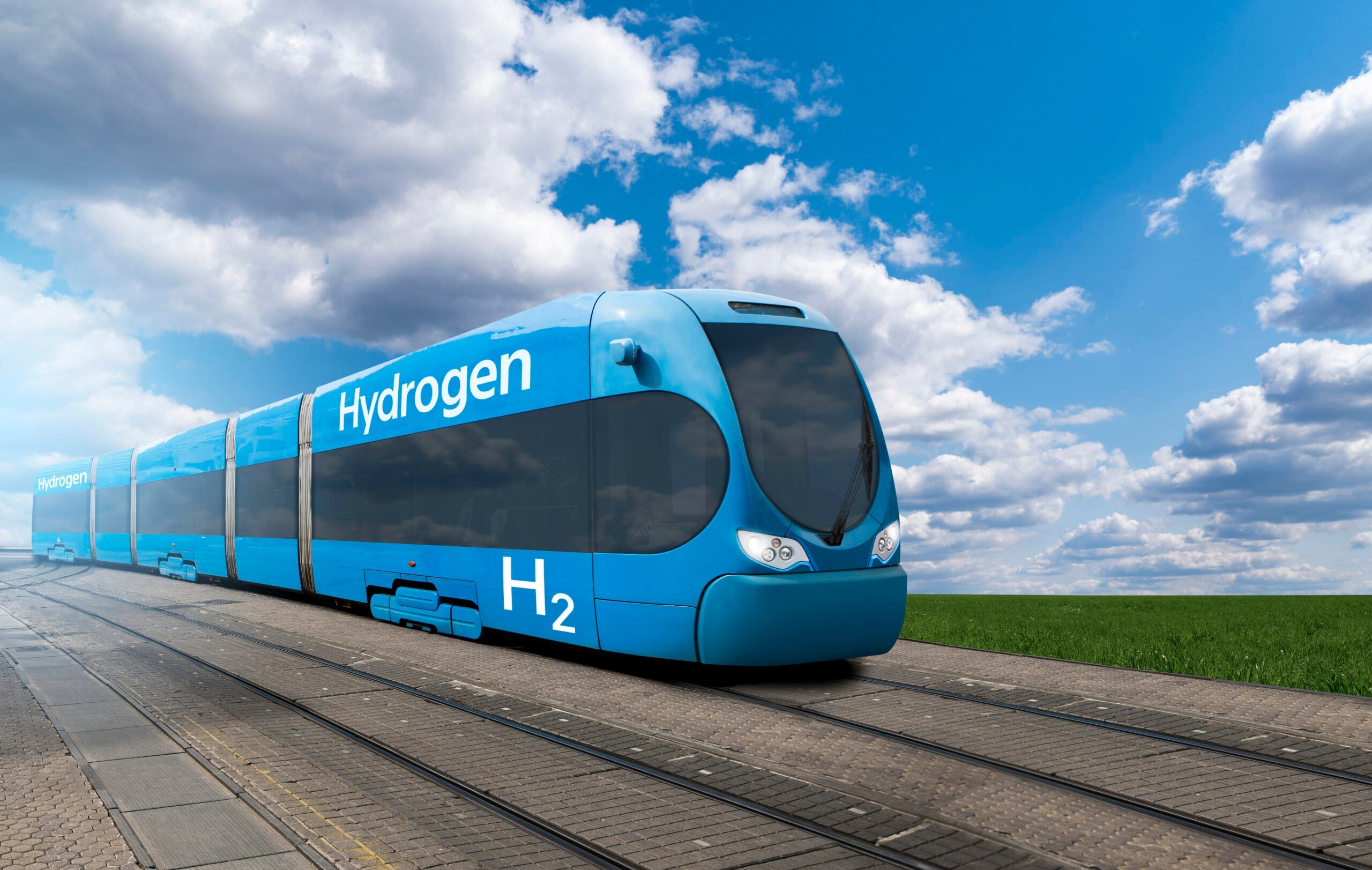 A hydrogen fuel cell train stands at the station