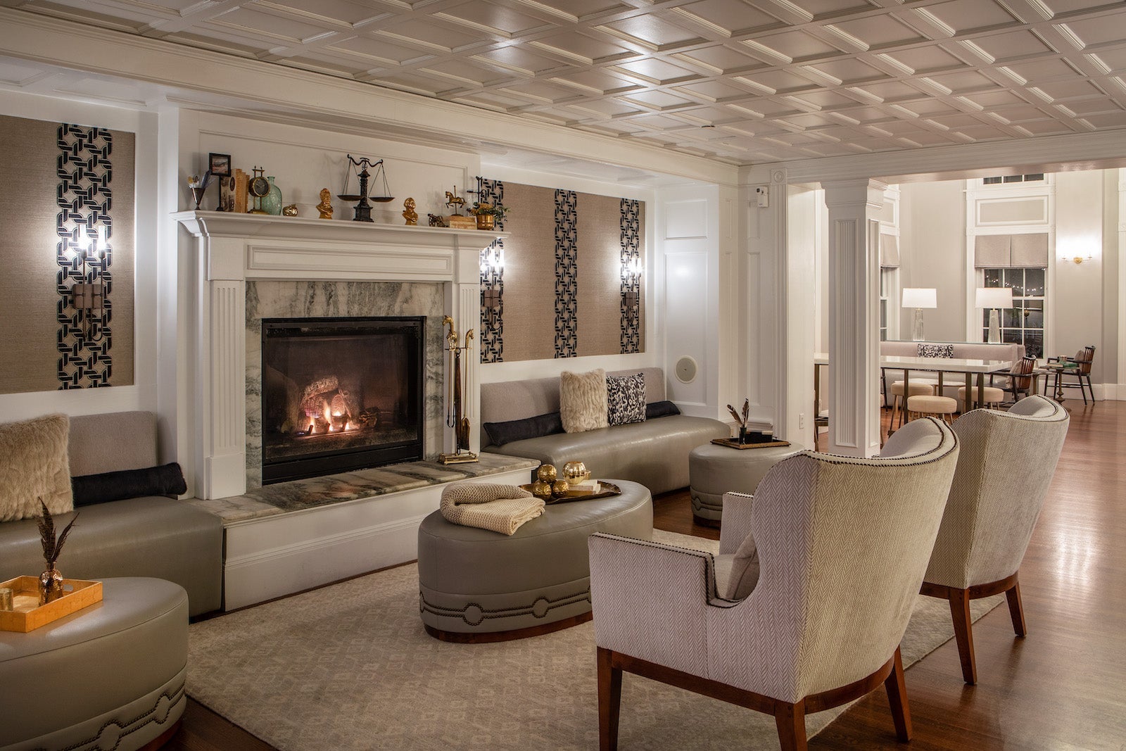 hotel lobby with fireplace, chairs