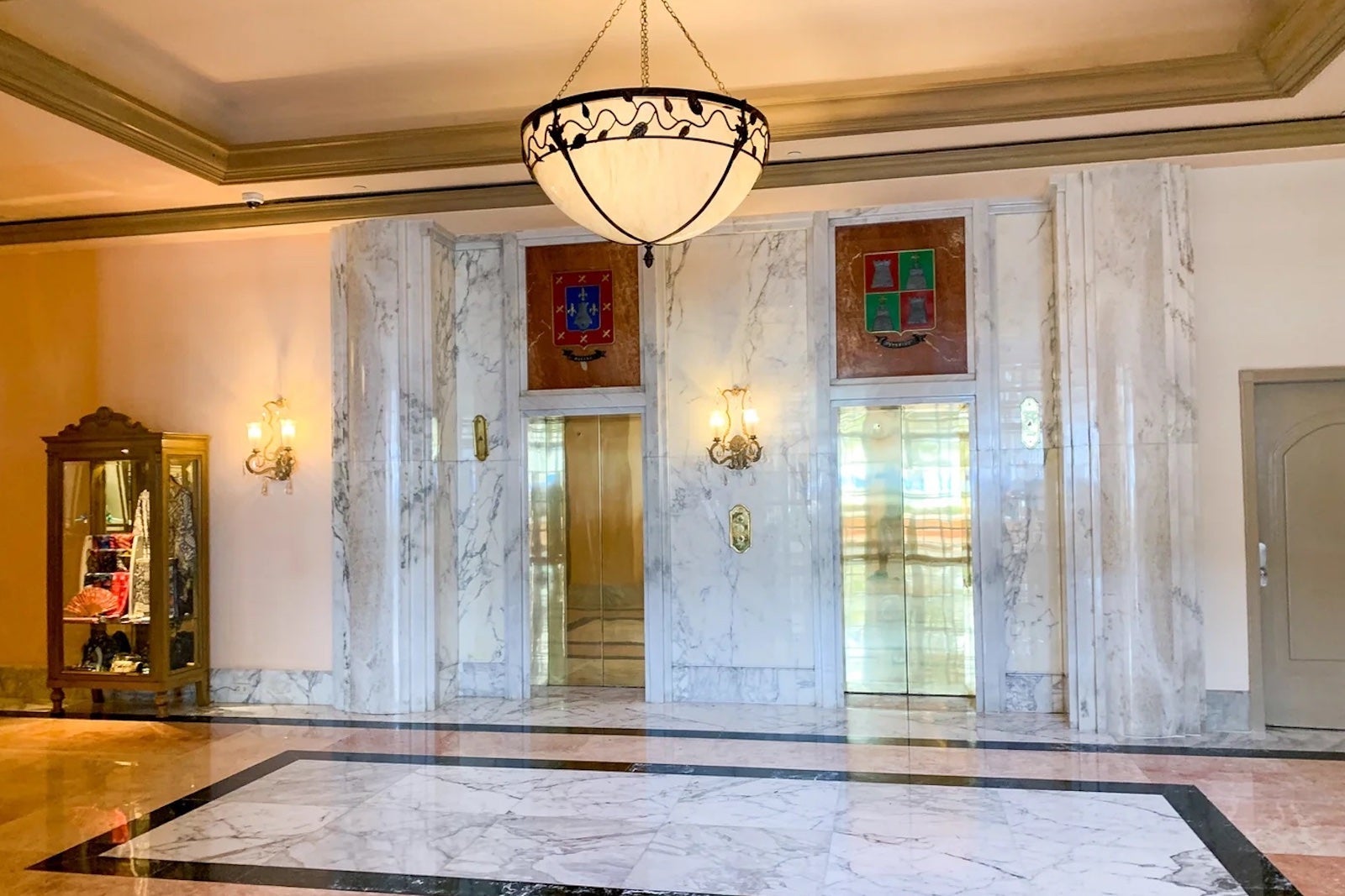 hotel lobby with gold elevators