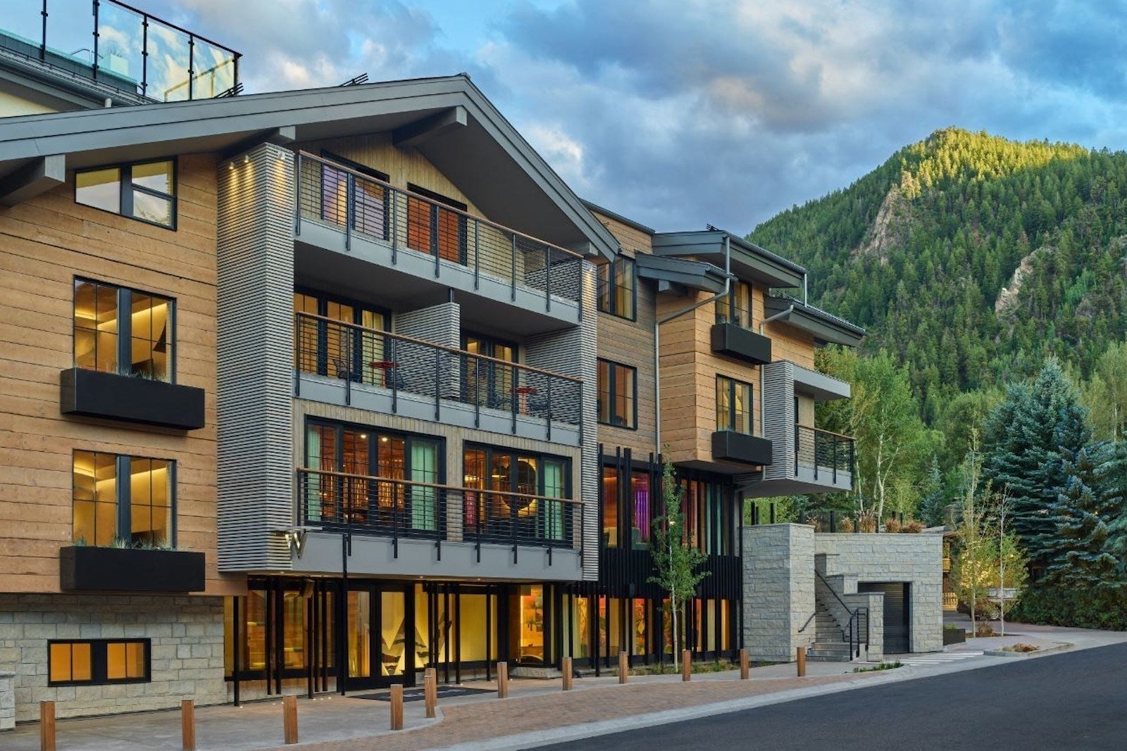 exterior photo of resort by mountains