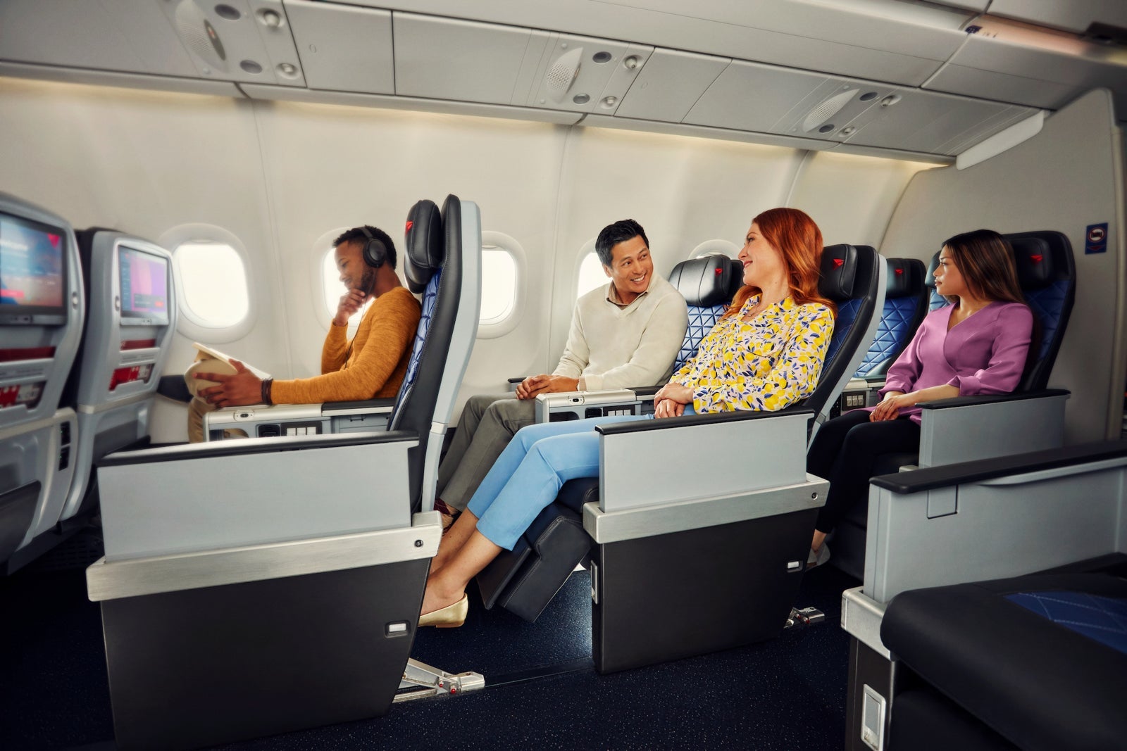 people sitting in airplane cabin