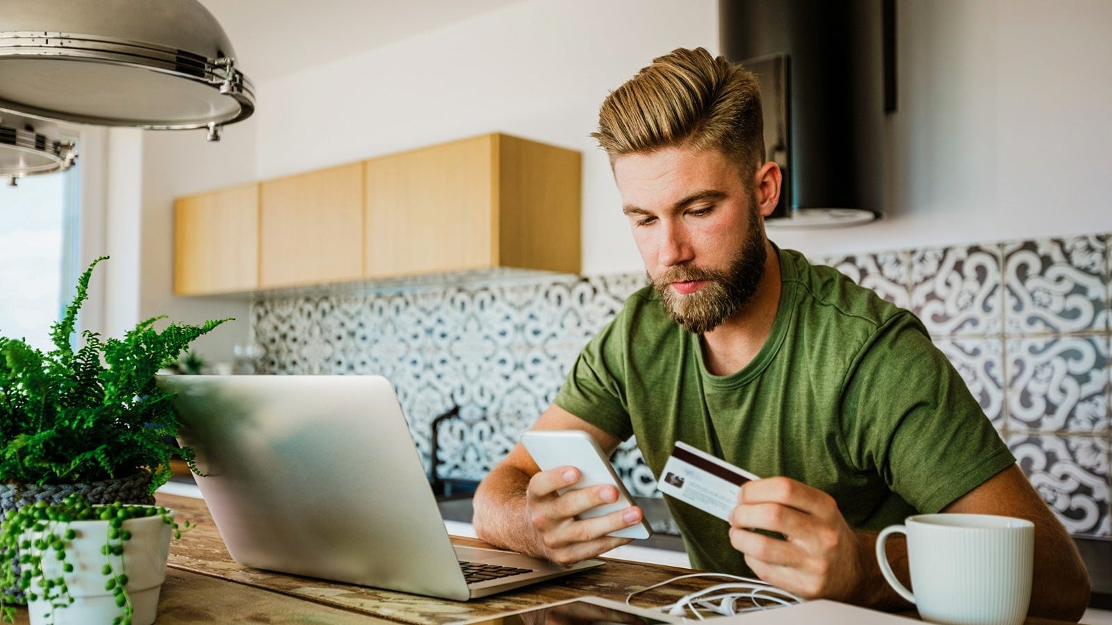 Young man shopping online