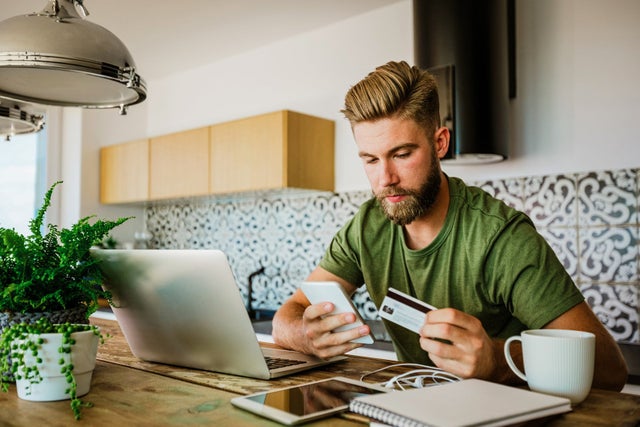 Young man shopping online