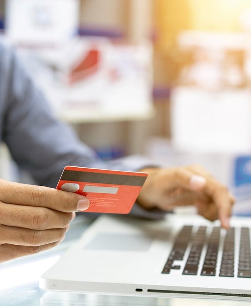 credit card and laptop