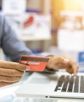 credit card and laptop