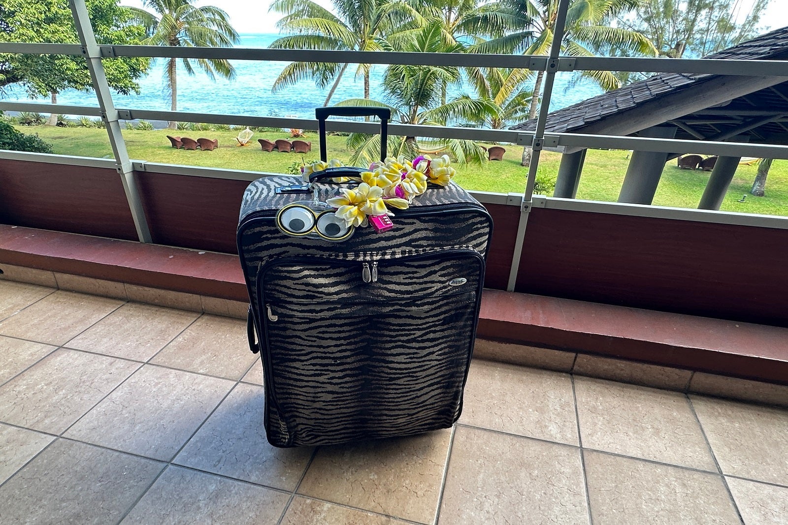 suitcase on hotel balcony