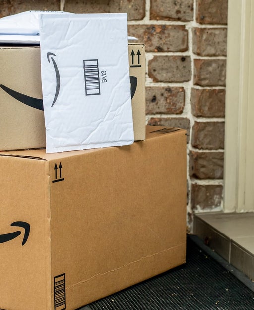 Amazon packages on a residential doorstep