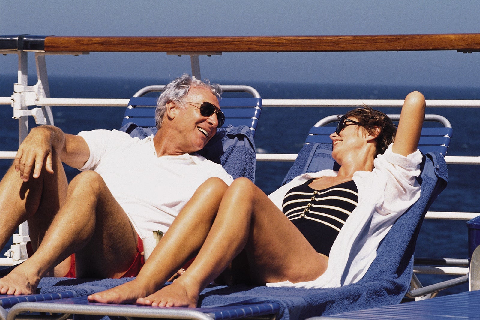Mature couple on deck of cruise ship